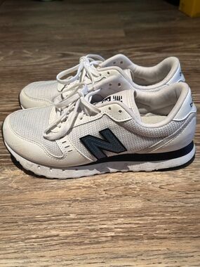 New Balance White Sneakers with Navy Blue 'N' Accent